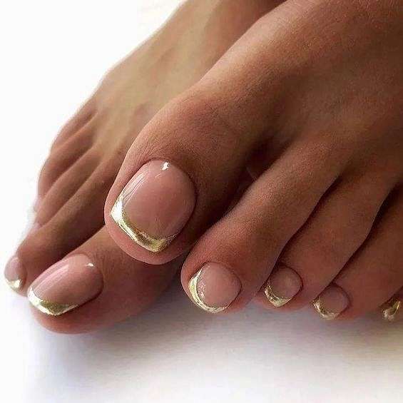 Classic gold French tip pedicure